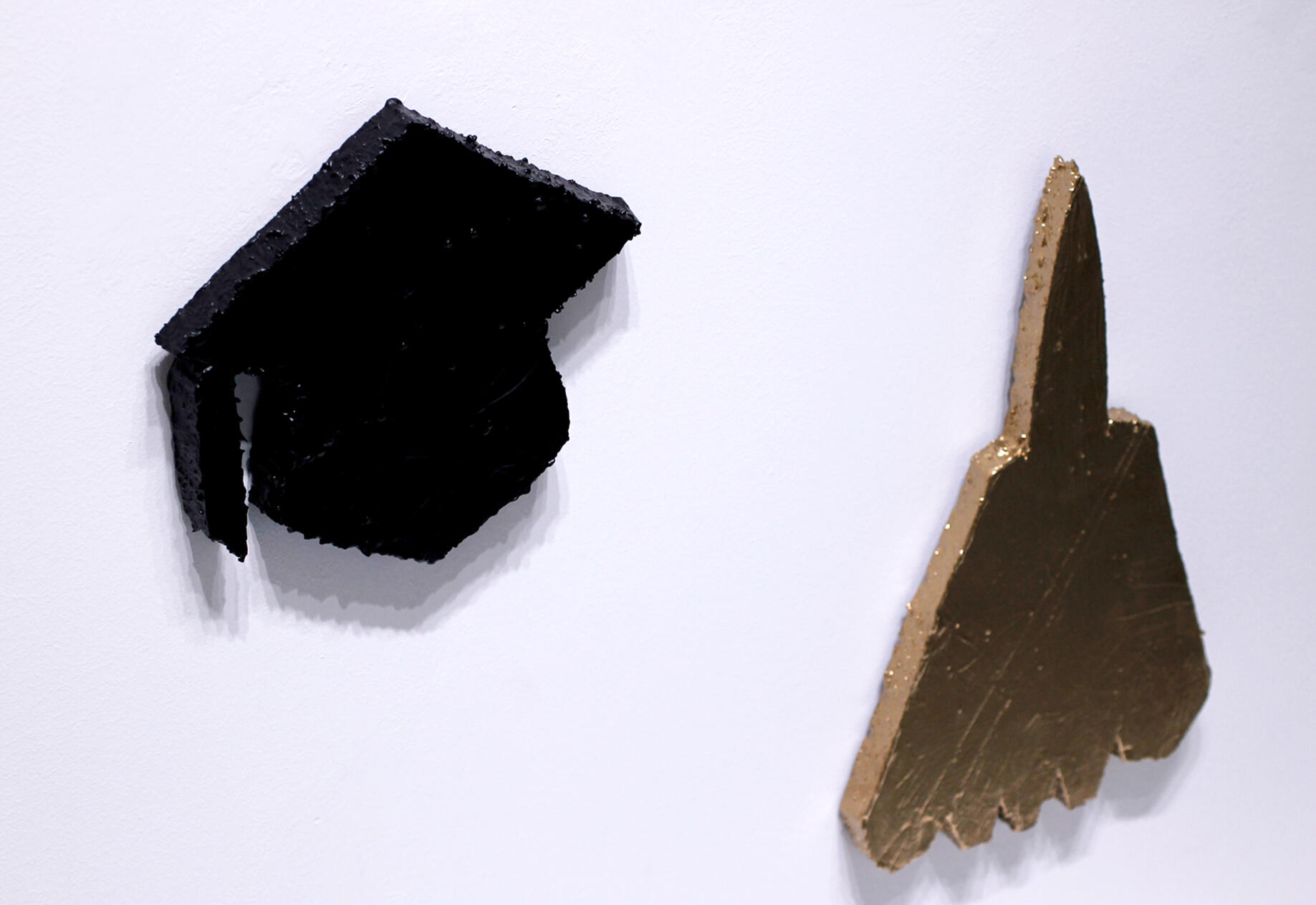 WHAT IS THE SHAPE OF AN ALBATROSS, detail view of graduation cap & F-14, 2026